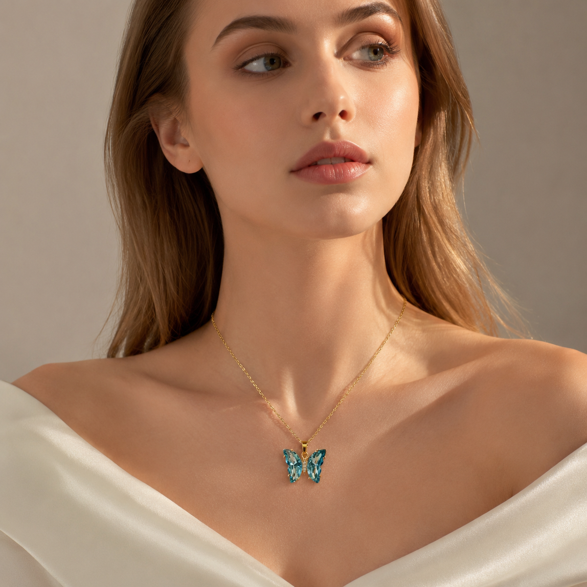 UDROZE Glacier Blue butterfly necklace - model wearing the necklace