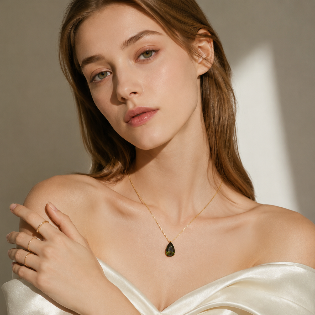 UDROZE August Olive Green teardrop birthstone necklace - model wearing the necklace